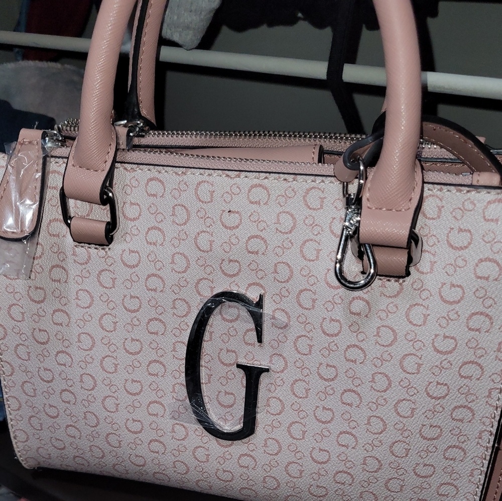 Guess crossbody. New with tags. Light rose color